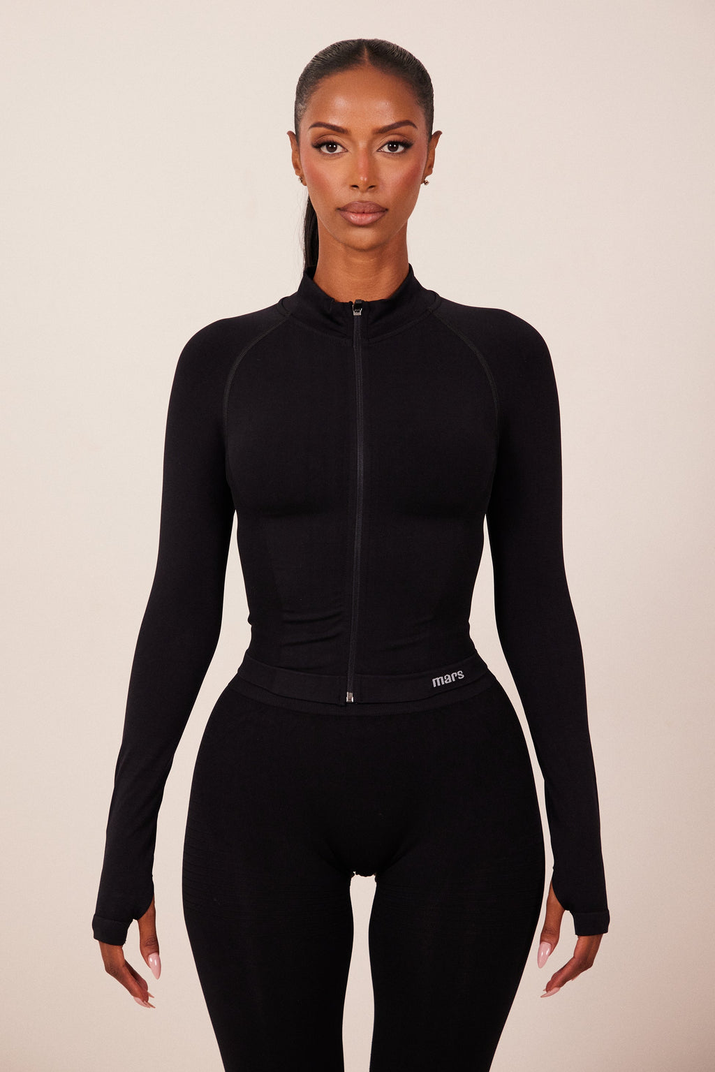 The Mars Seamless Zip Jacket in Black