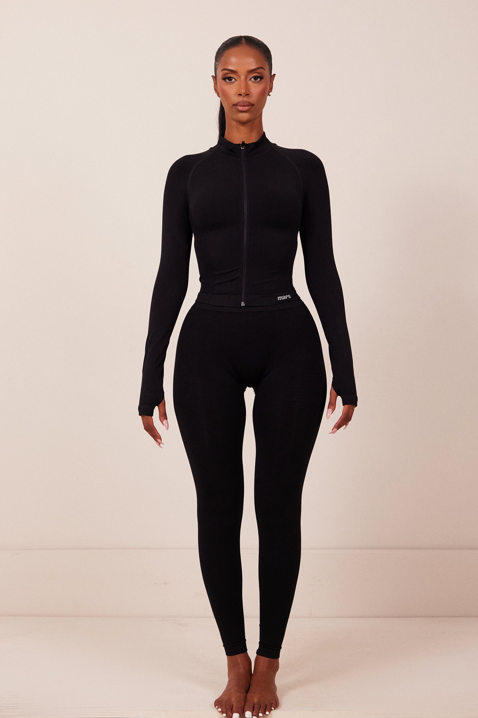 The Mars Seamless Zip Jacket in Black