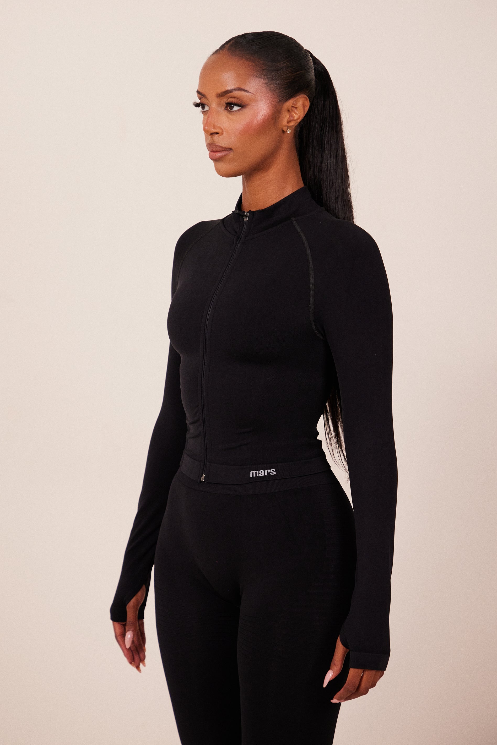 The Mars Seamless Zip Jacket in Black