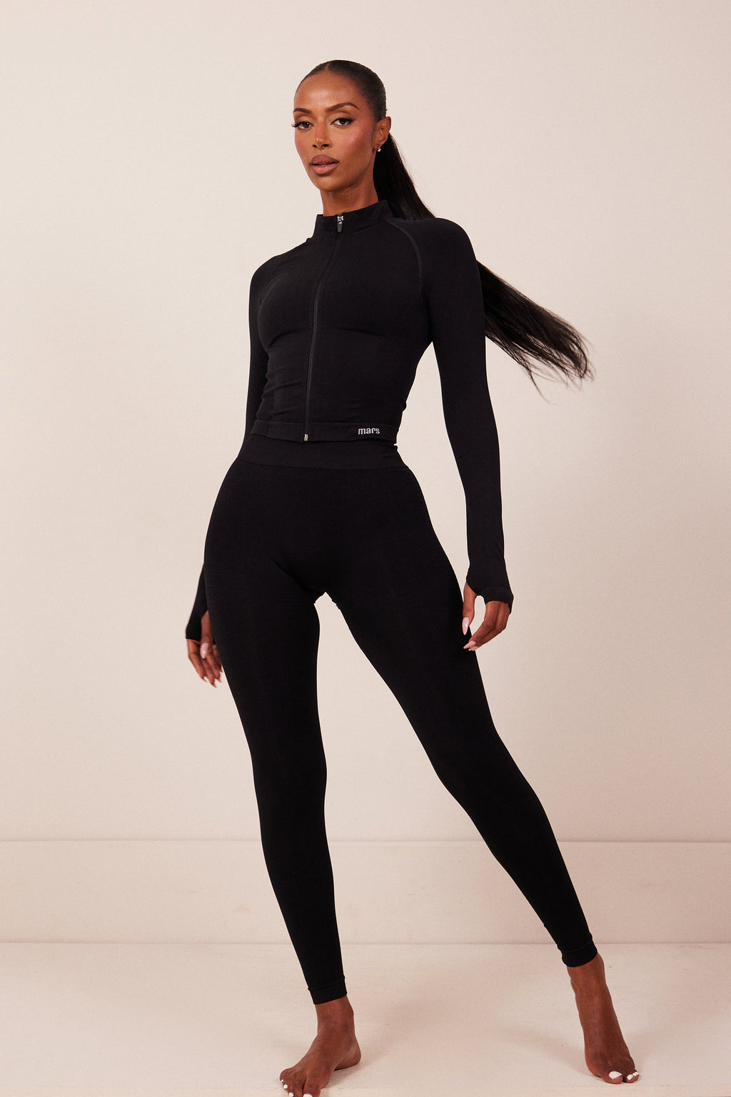 The Mars Seamless Zip Jacket in Black