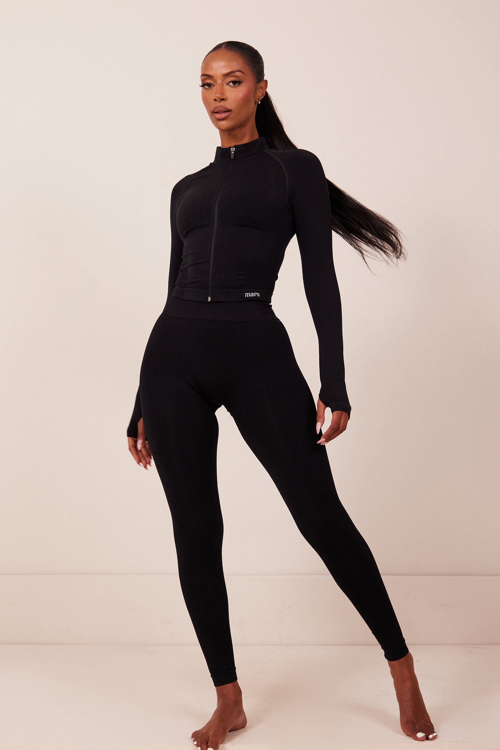 The Mars Seamless Zip Jacket in Black