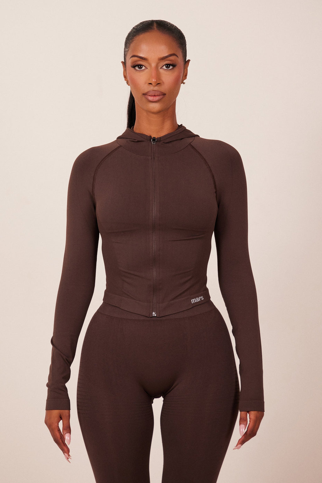 The Mars Seamless Hooded Zip Jacket in Brown