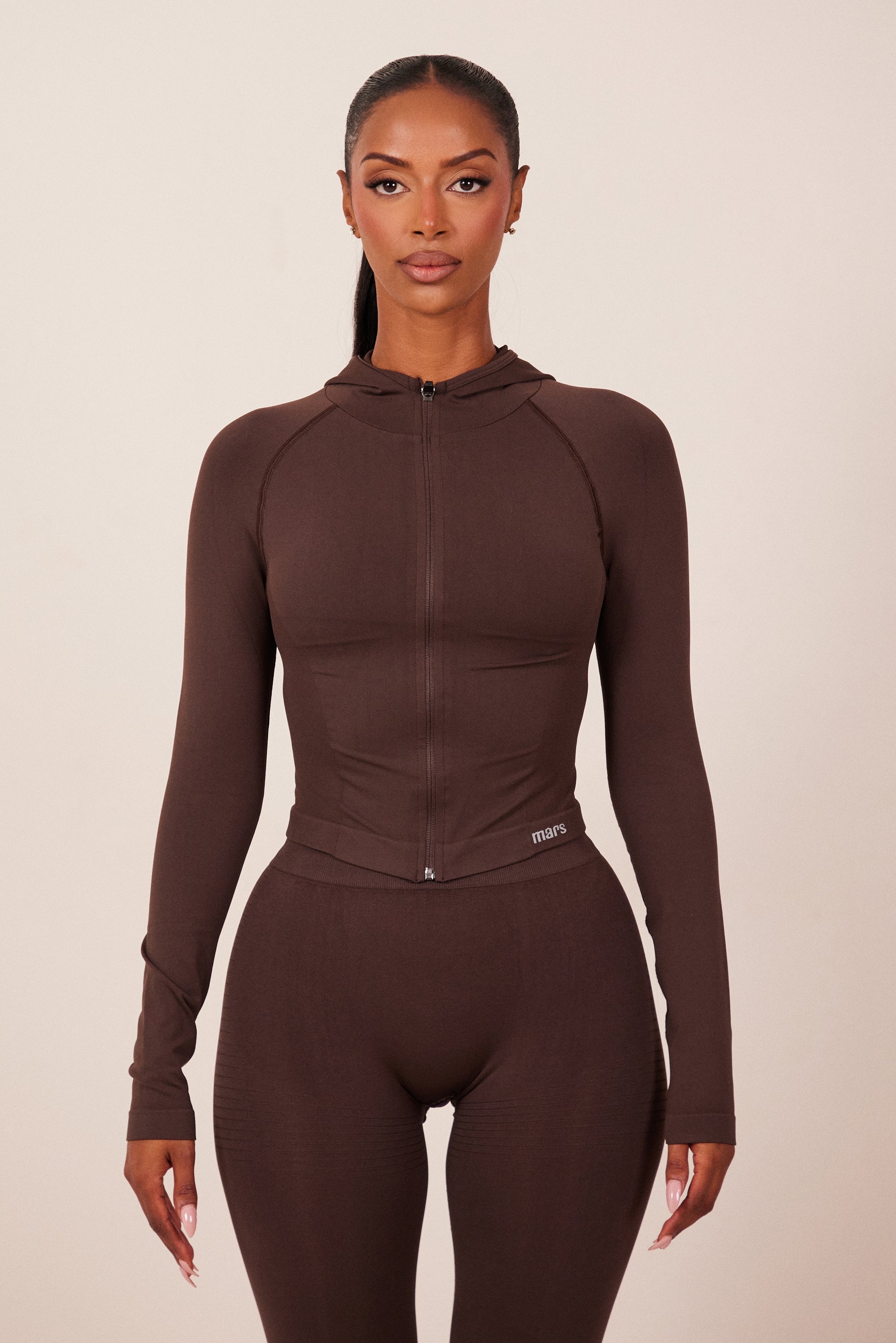 The Mars Seamless Hooded Zip Jacket in Brown