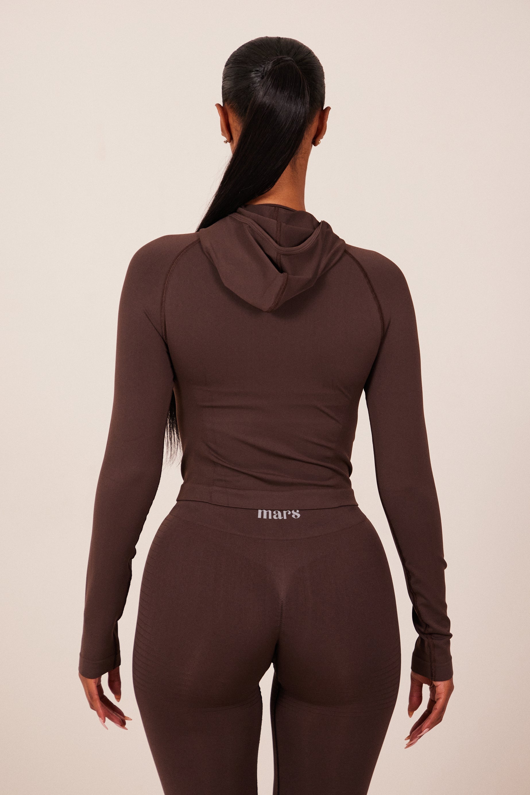 The Mars Seamless Hooded Zip Jacket in Brown