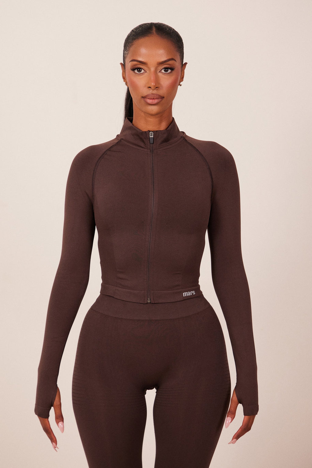 The Mars Seamless Zip Jacket in Brown