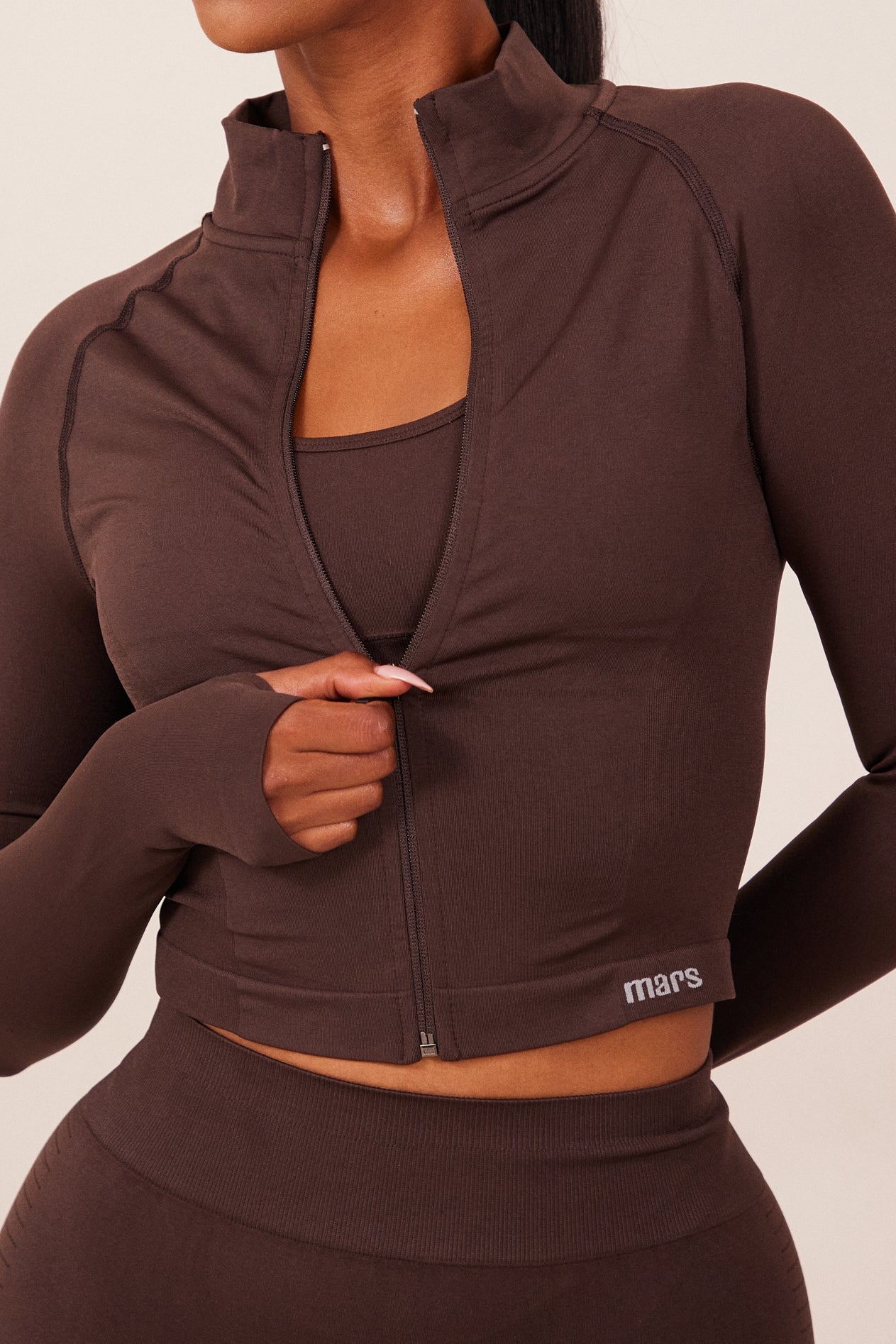 The Mars Seamless Zip Jacket in Brown