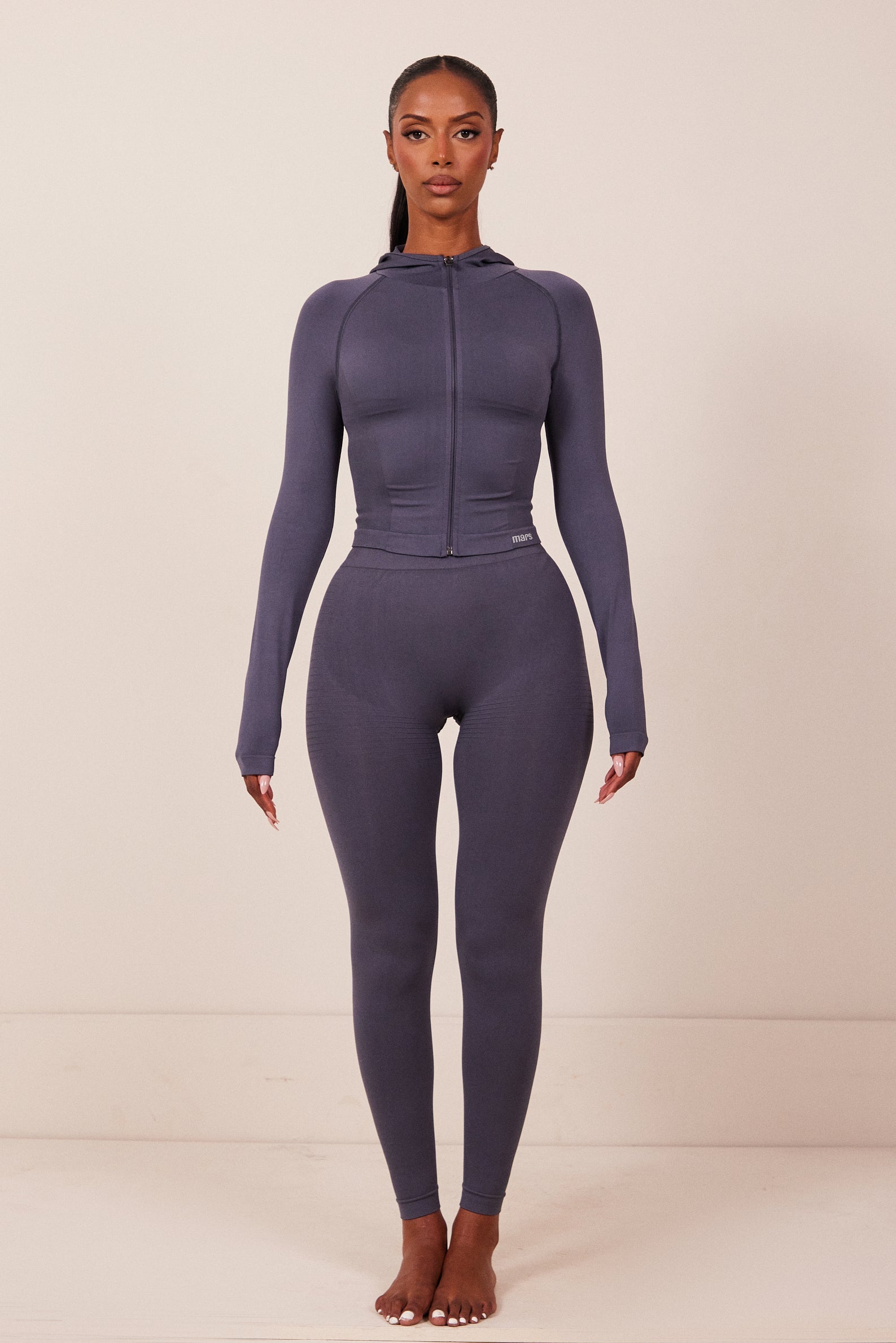 The Mars Seamless Hooded Zip Jacket in Navy