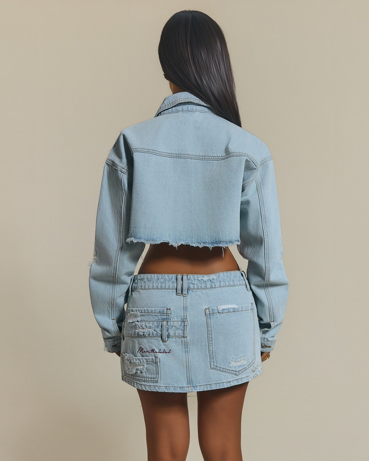 The Esha Denim Mini Skirt in Light Wash Blue