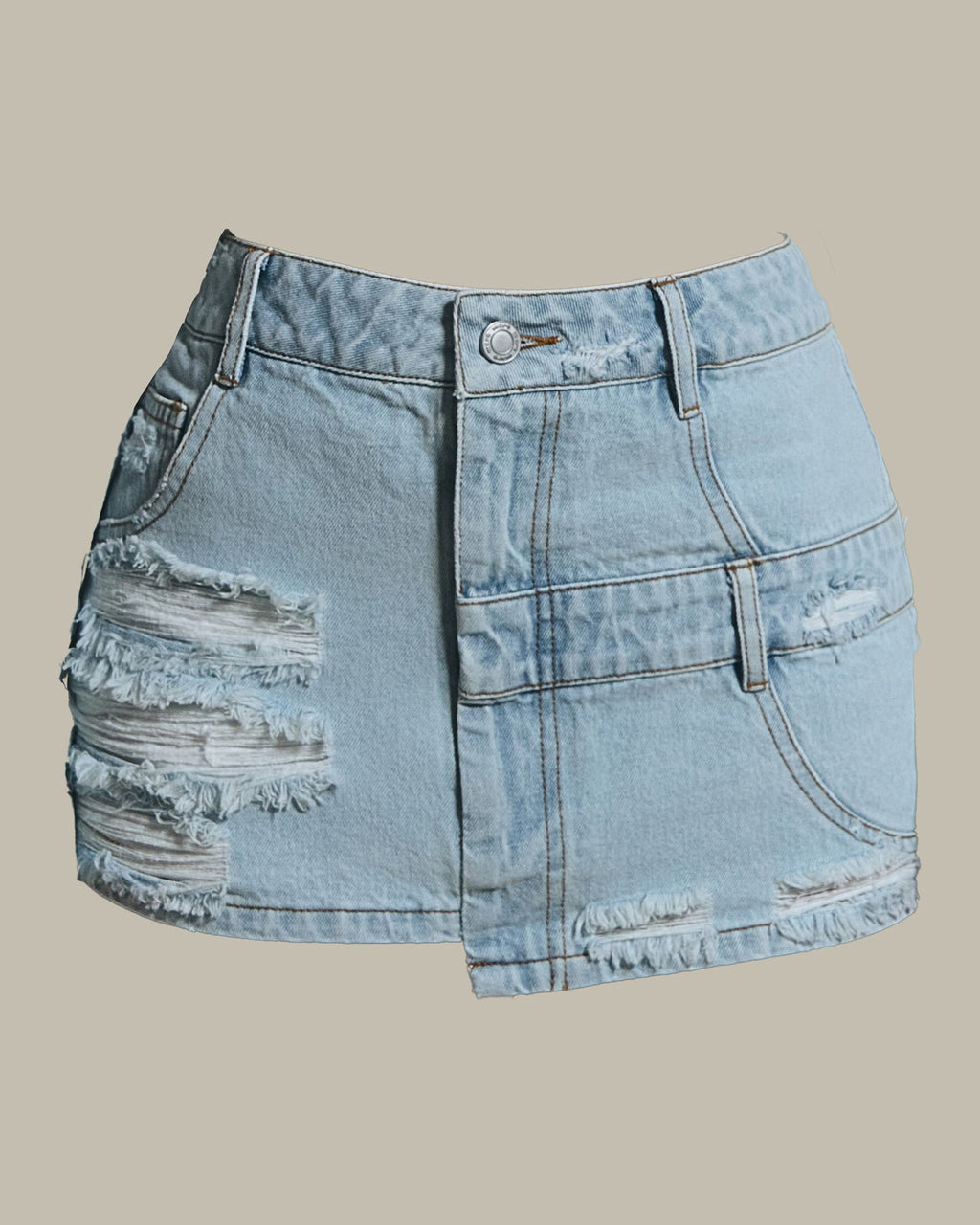 The Esha Denim Mini Skirt in Light Wash Blue