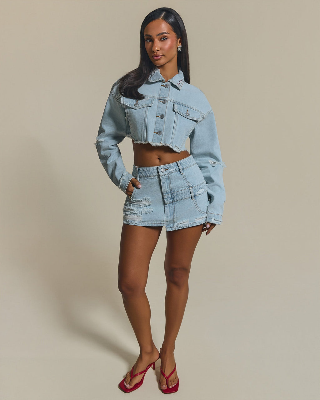 The Esha Denim Mini Skirt in Light Wash Blue