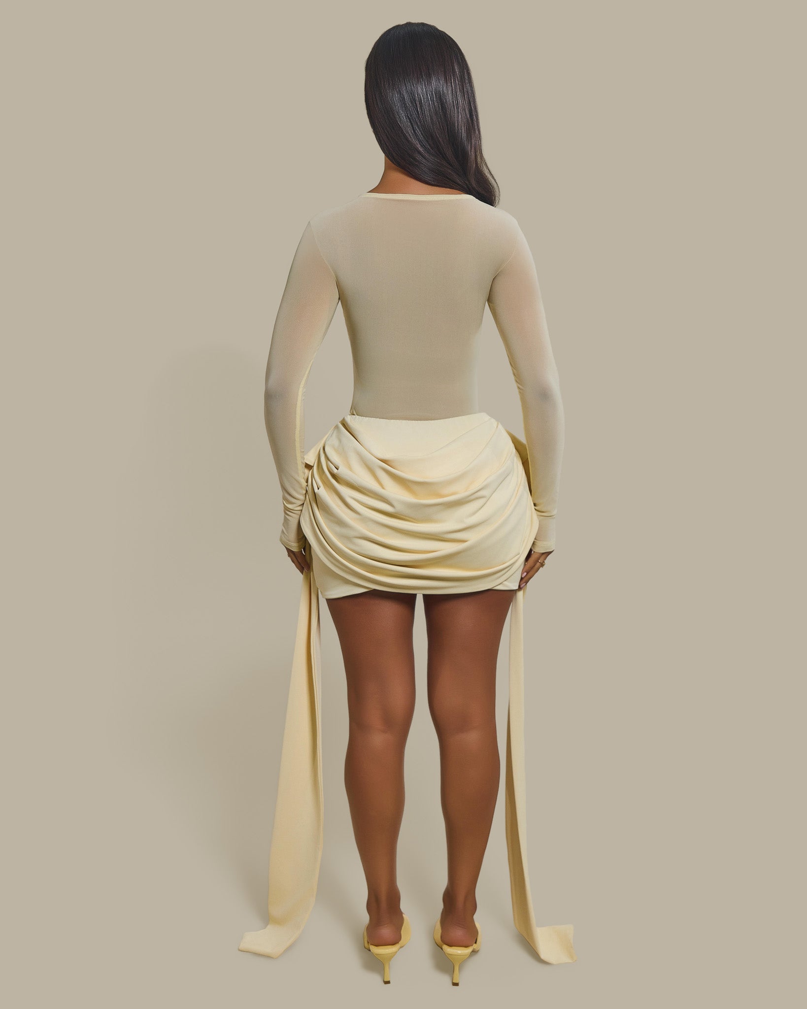 The Yara Draped Mini Skirt in Butter Yellow