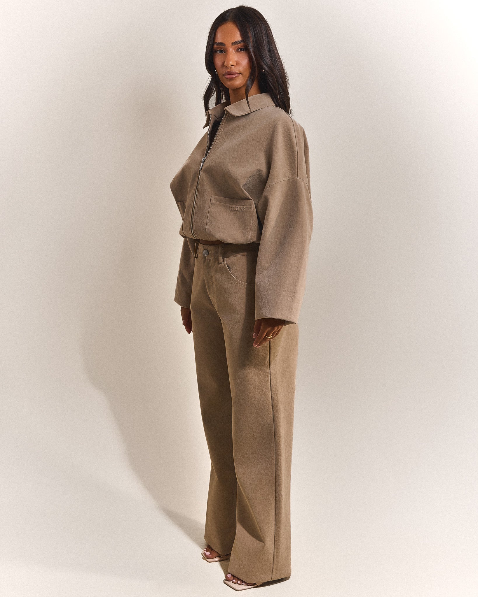 The Isla Faux Suede Cropped Jacket in Beige
