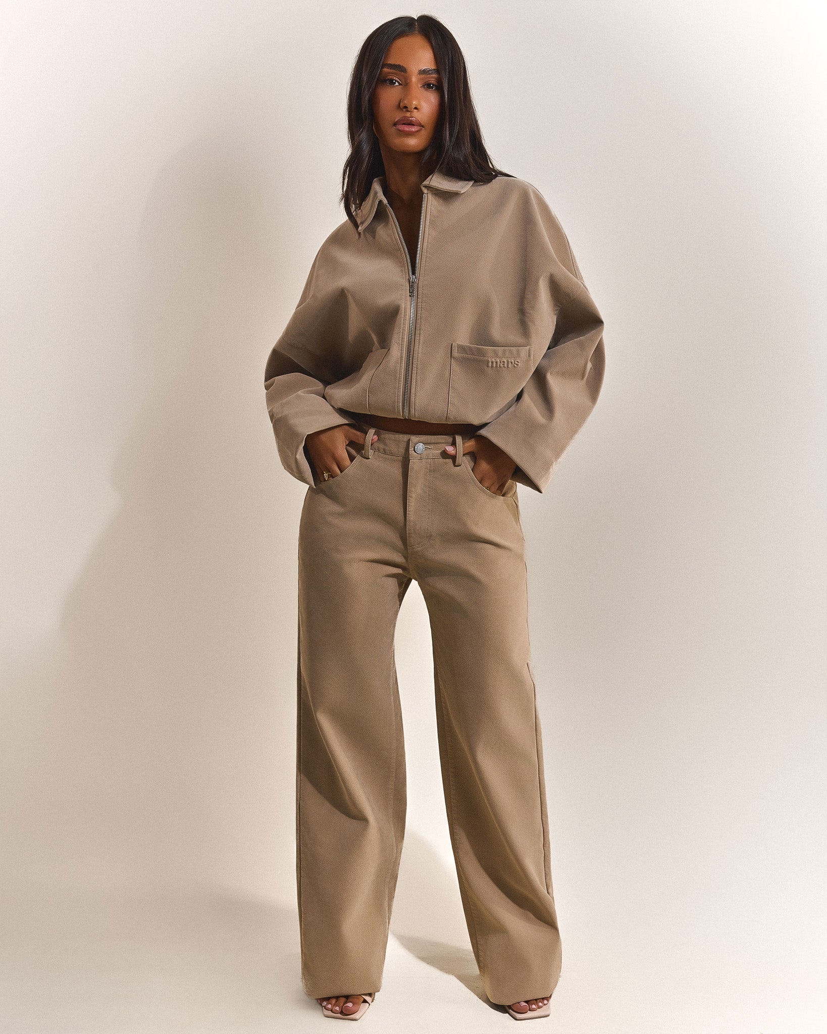 The Isla Faux Suede Cropped Jacket in Beige